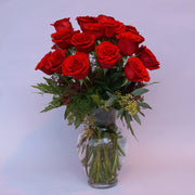 Gorgeous imported long stem red roses in a tall vase. Perfect for the most romantic day of the year. to send your love.