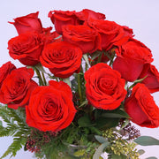 Gorgeous imported long stem red roses in a tall vase. Perfect for the most romantic day of the year. to send your love.