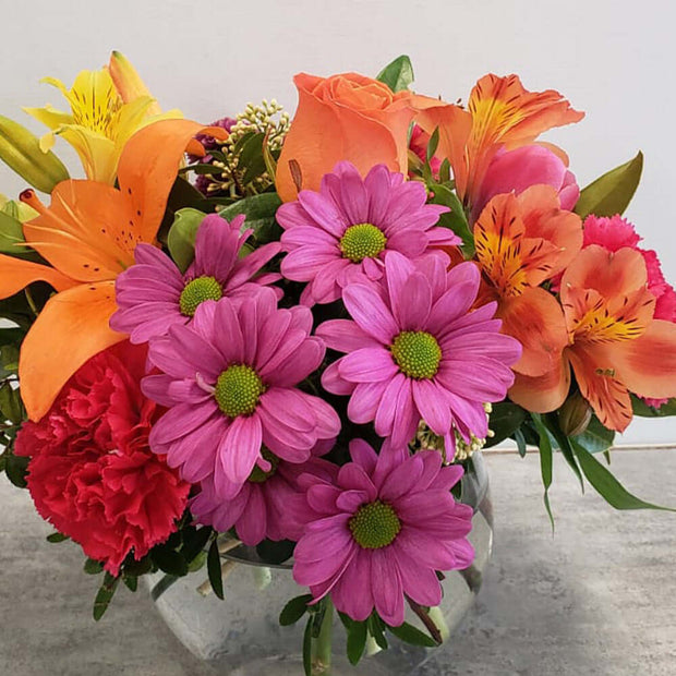 A rich gathering of yellow, pink and orange blooms.  A way to express your sentiments to someone. We deliver in Coquitlam, Port Coquitlam and Burnaby.