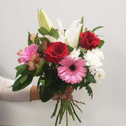 Bouquet of white, red and pink flowers; is a classic-romantic hand-tied bouquet, ideal to express your love any day. 