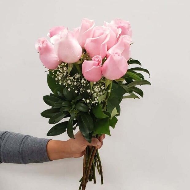 Gorgeous long-stemmed and imported dozen pink roses accompanied with filler flowers and seasonal greenery. Don't need to wait for a special occasion to send your emotions.