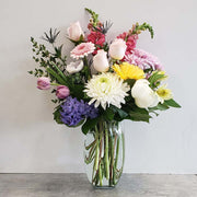 Soft coloured vase arrangement with a light fragrance flowers. Perfect for those who love the soft colours.